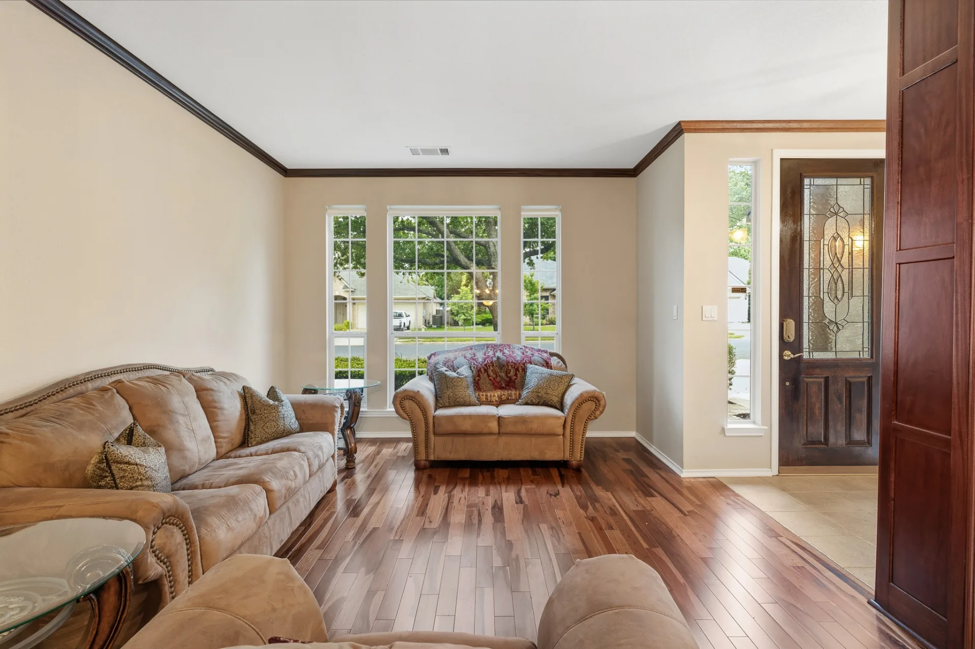 Front living room with hardwood floors and bay window