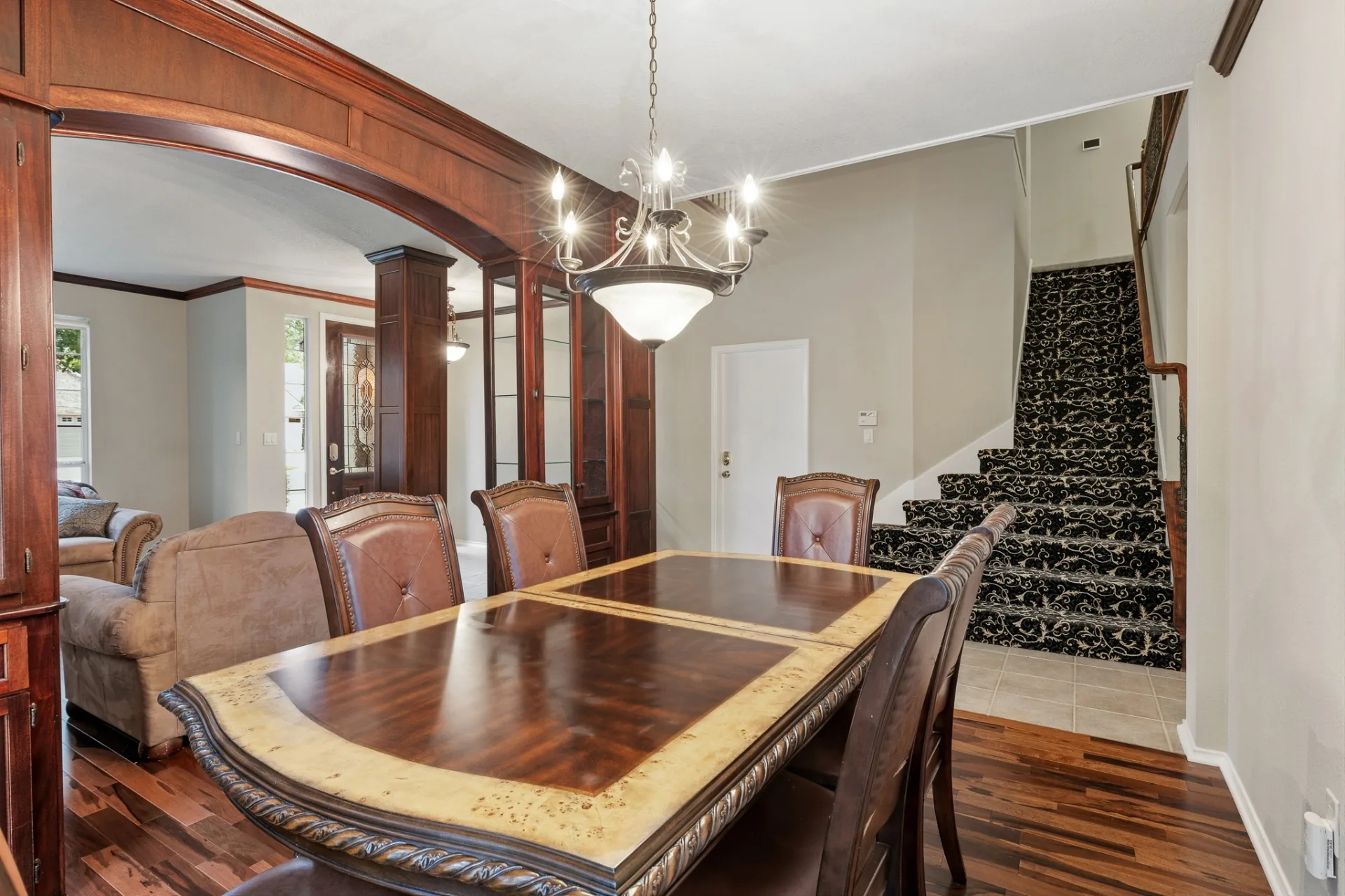 Dining room with staircase and second-floor landing